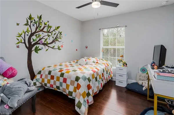 a view of a house with swimming pool and sitting area