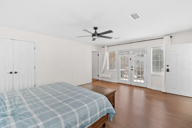 a bathroom with a bathtub and a toilet