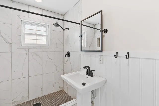 a view of a patio with furniture and a yard