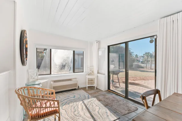 an aerial view of houses with outdoor space
