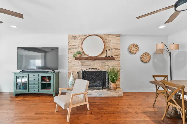 a dining room with furniture and window