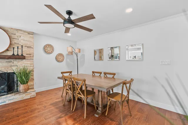 a view of a livingroom with furniture and a fireplace