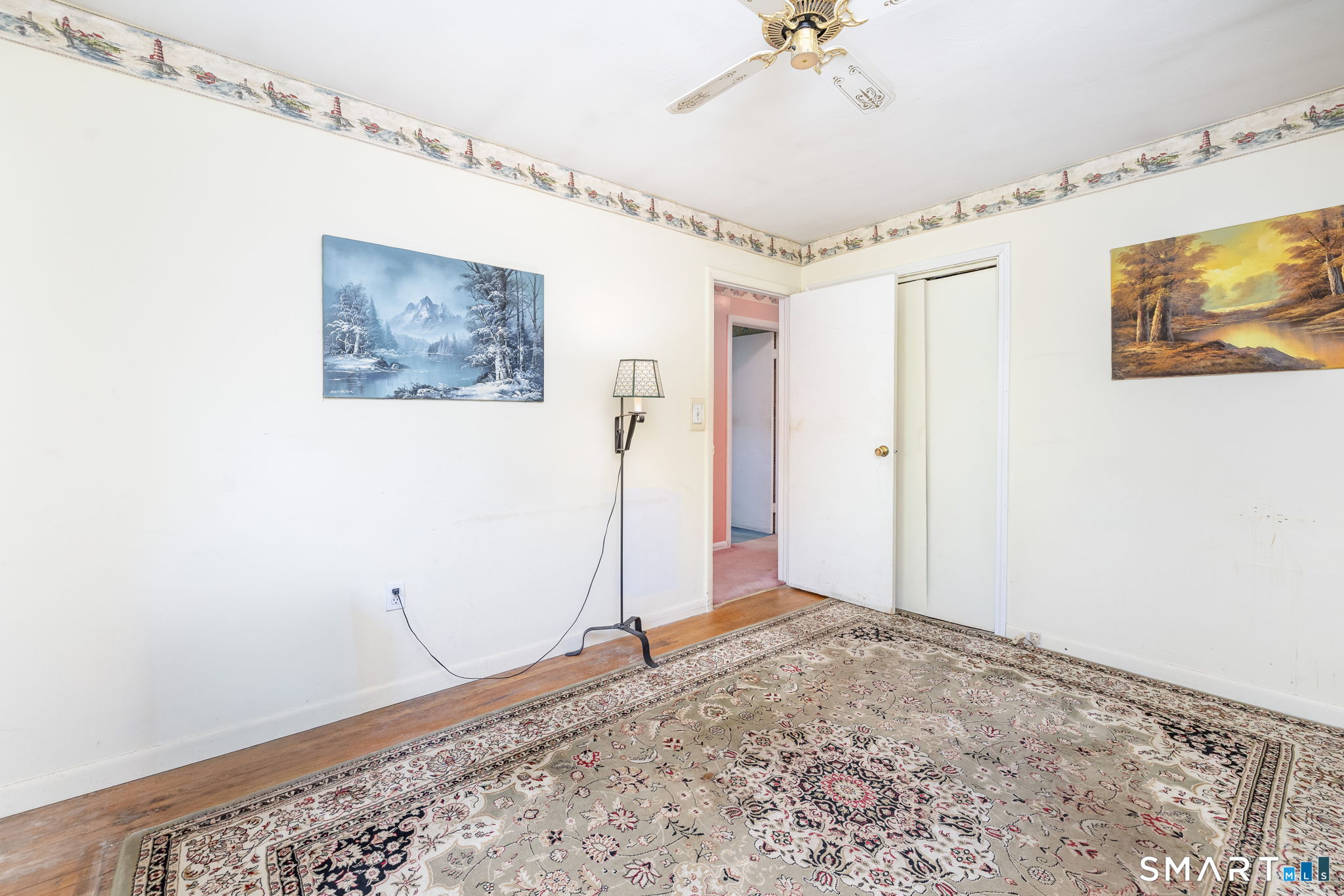189 Bee Street Meriden, CT 06450 - Photo 12 of 39 a view of a hallway with a large window