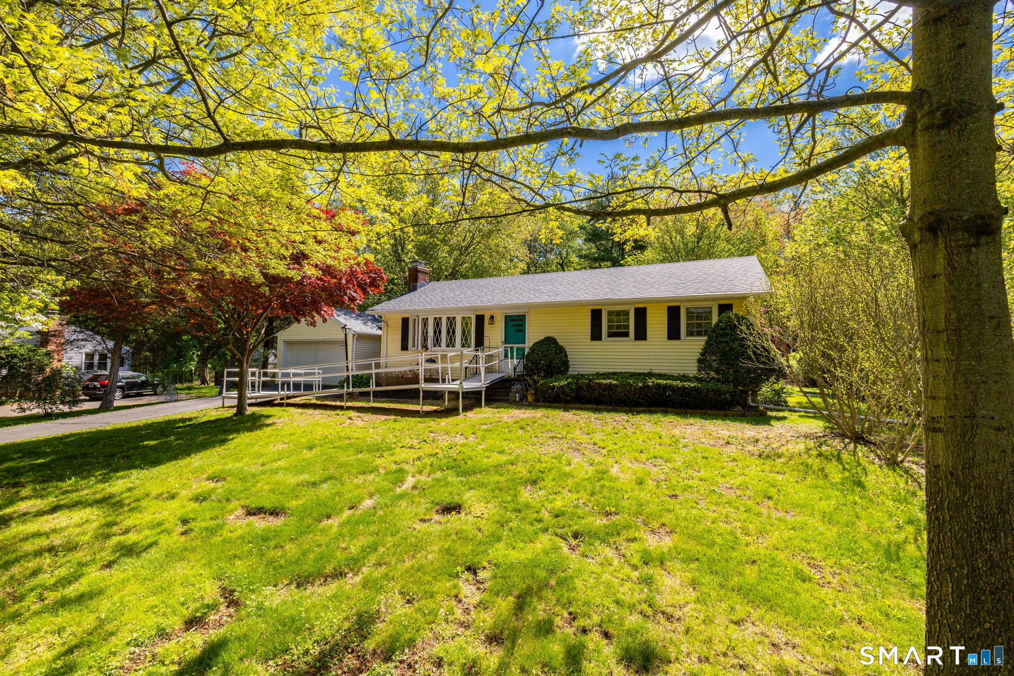 189 Bee Street Meriden, CT 06450 - Photo 2 of 39 a front view of a house with a yard and swimming pool