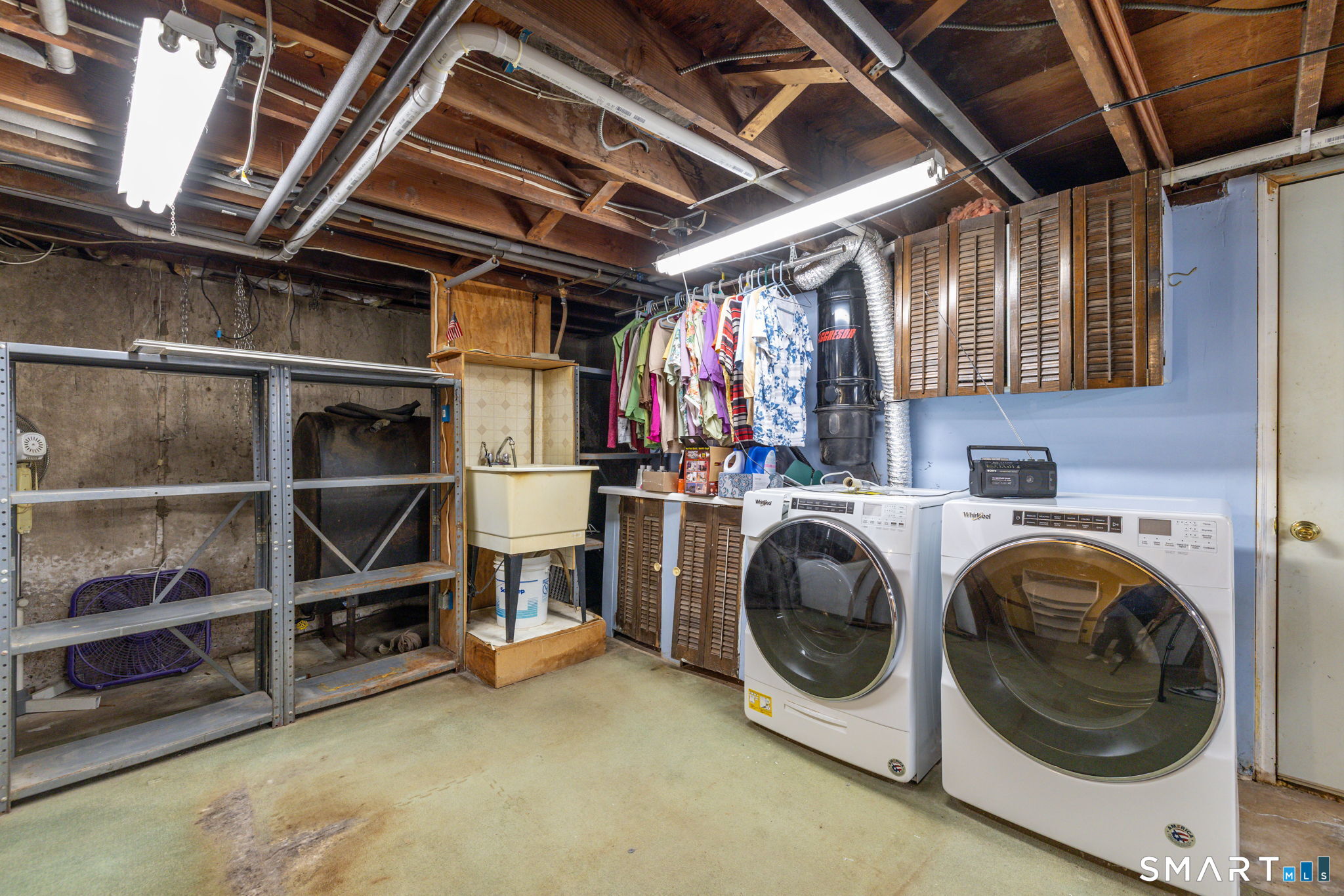 189 Bee Street Meriden, CT 06450 - Photo 22 of 39 a view of a storage and utility room with washer and dryer