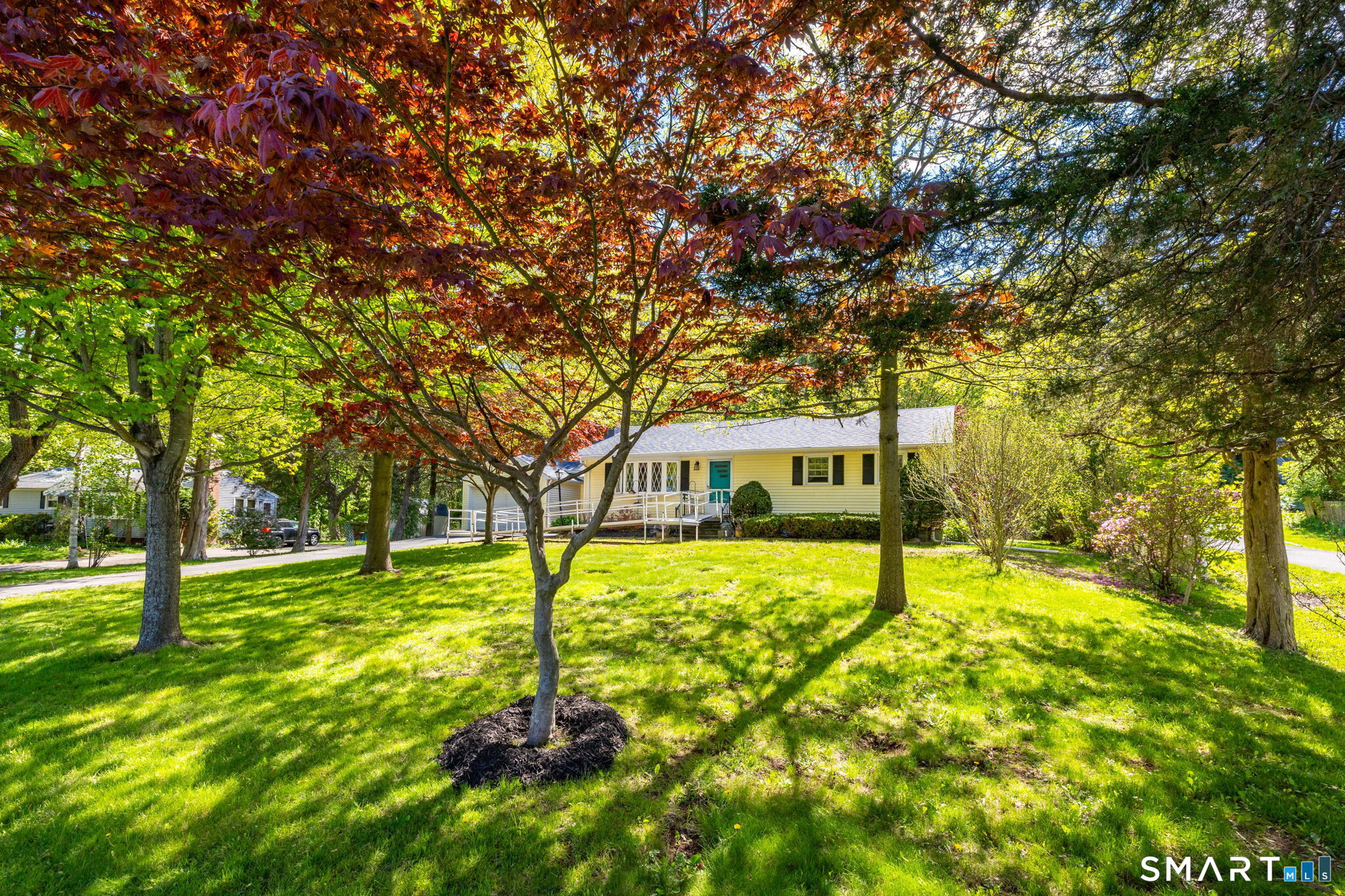 189 Bee Street Meriden, CT 06450 - Photo 3 of 39 a front view of house with yard and green space