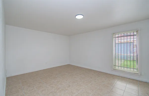 an empty room with a window