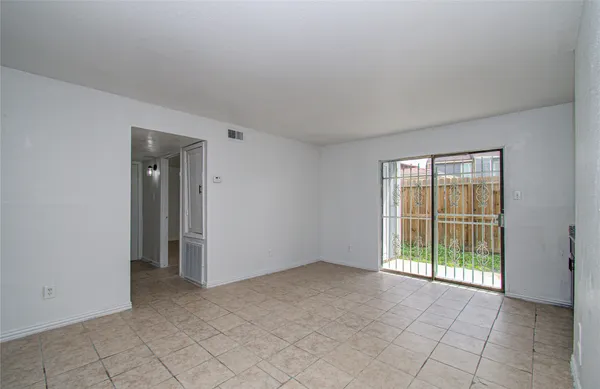 a view of an empty room with window