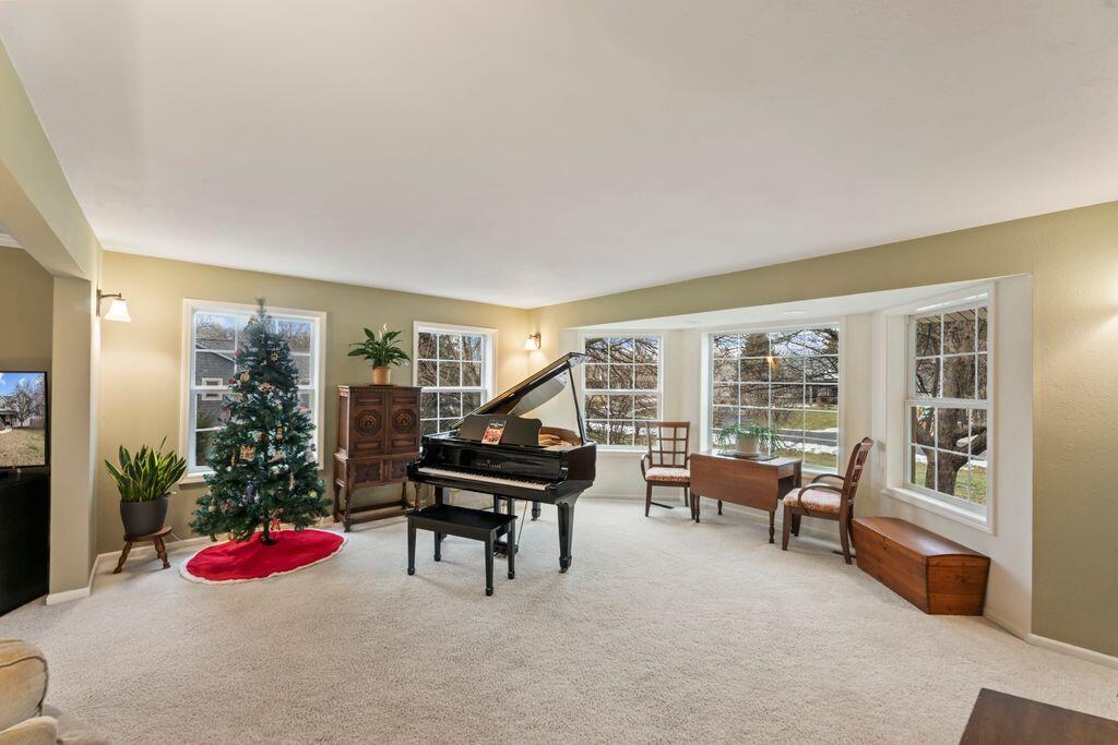 412 East Red Pine Circle Dousman, WI 53118 - Photo 8 of 33 Relaxing Living Room large windows