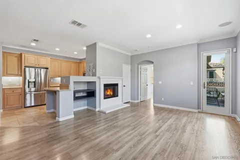 a view of a kitchen with furniture and a fireplace