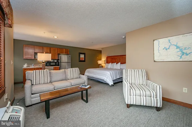 a bedroom with furniture and a couch