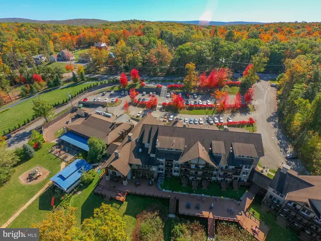 an aerial view of residential house with outdoor space