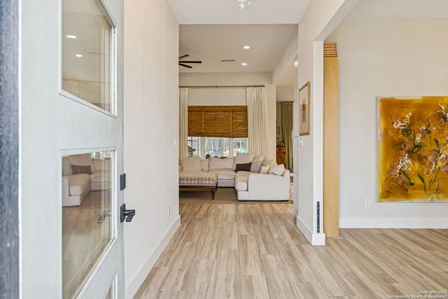 a living room with a bed and furniture