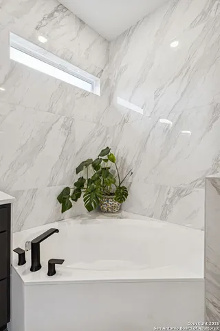 a bathroom with a bathtub