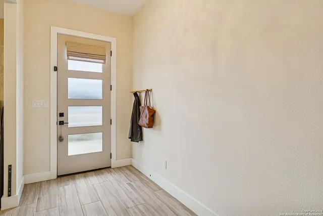 a view of walk in closet with window