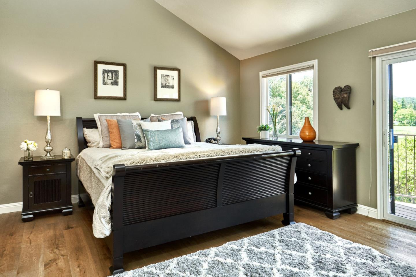 1264 Chateau Drive San Jose, CA 95120 - Photo 26 of 44 a bedroom with a bed and a lamp