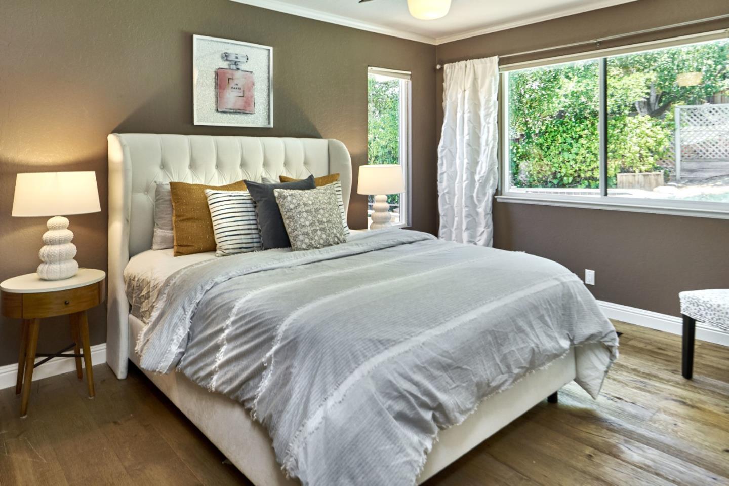 1264 Chateau Drive San Jose, CA 95120 - Photo 31 of 44 a bedroom with a bed and wooden floor