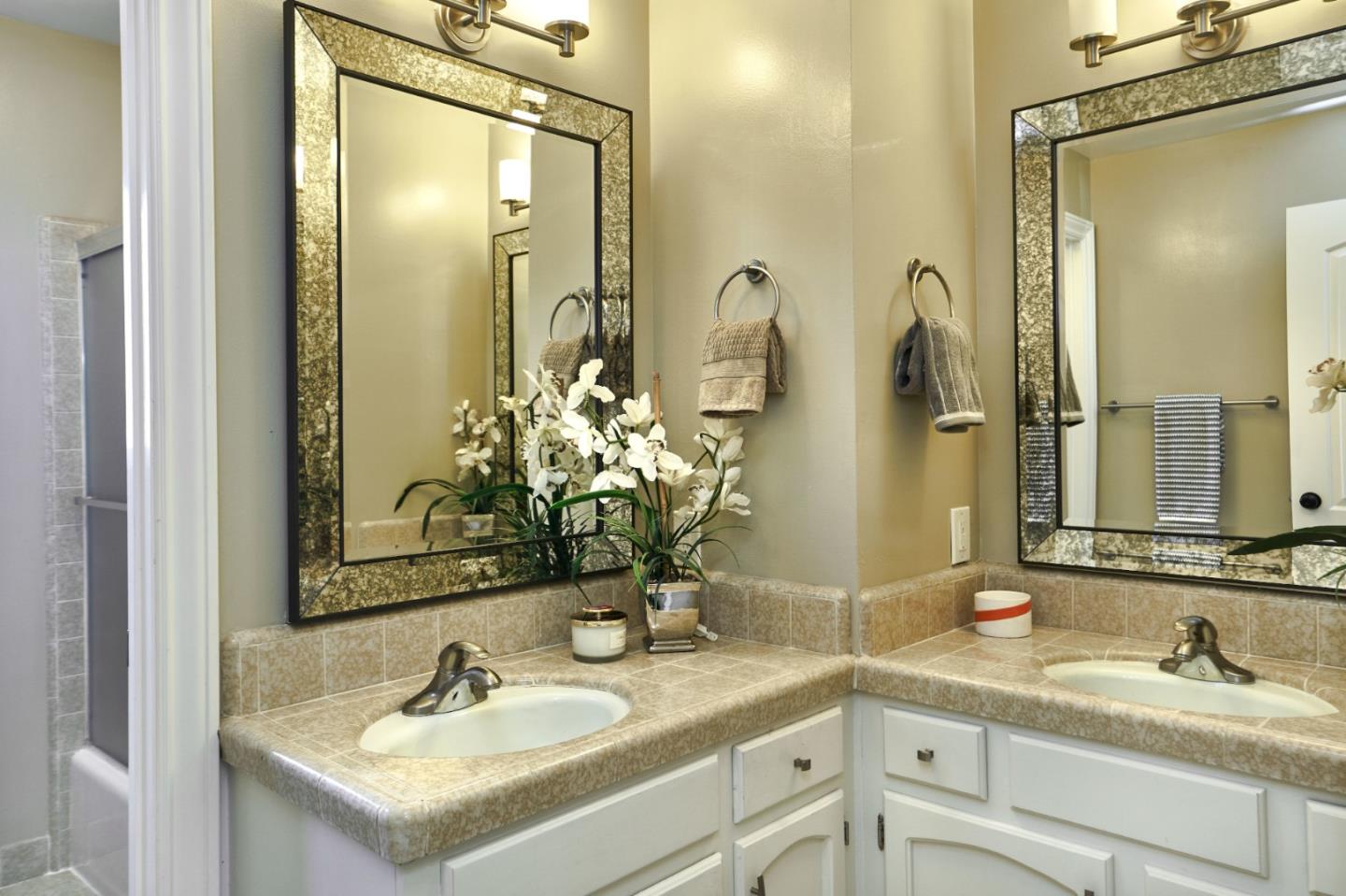 1264 Chateau Drive San Jose, CA 95120 - Photo 35 of 44 a bathroom with a sink and a mirror
