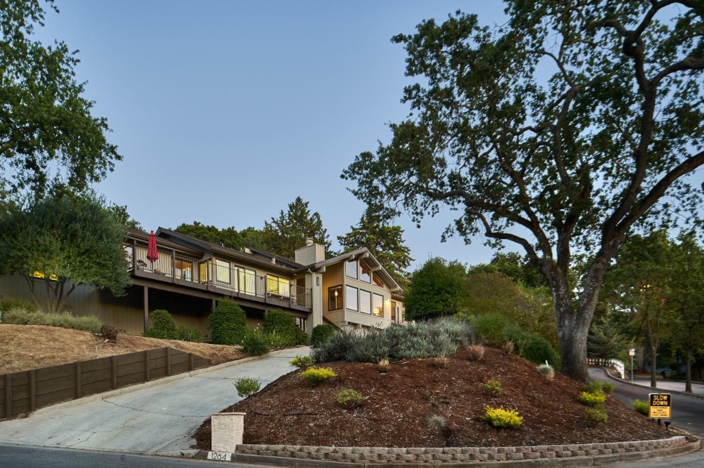 1264 Chateau Drive San Jose, CA 95120 - Photo 5 of 44 a front view of a house with a yard