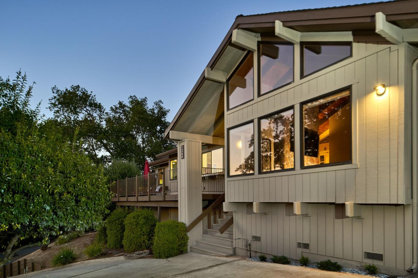 1264 Chateau Drive San Jose, CA 95120 - Photo 6 of 44 a front view of a house with a garden