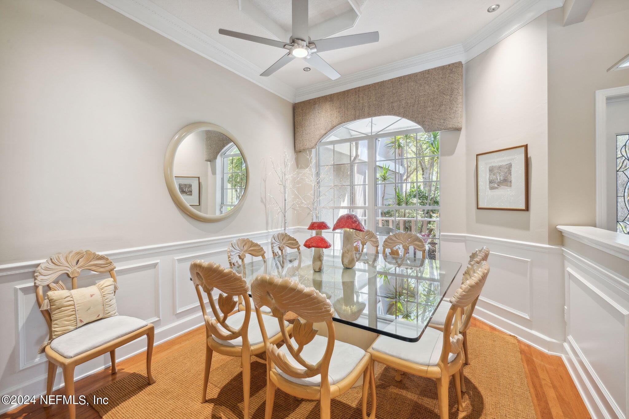 144 Bear Pen Road Ponte Vedra Beach, FL 32082 - Photo 18 of 74 a view of a dining room with furniture and a large window