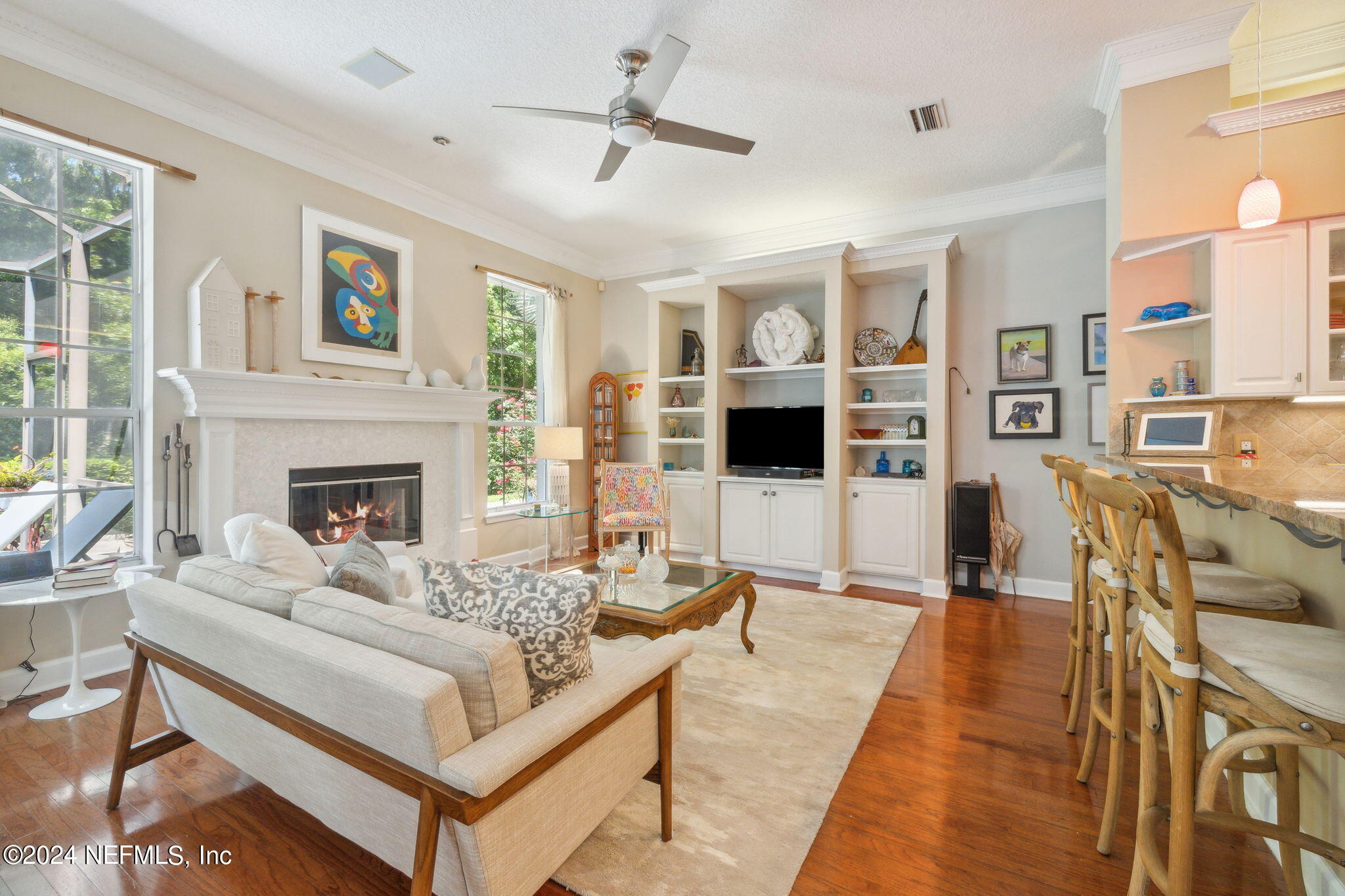144 Bear Pen Road Ponte Vedra Beach, FL 32082 - Photo 20 of 74 a living room with furniture and a fireplace