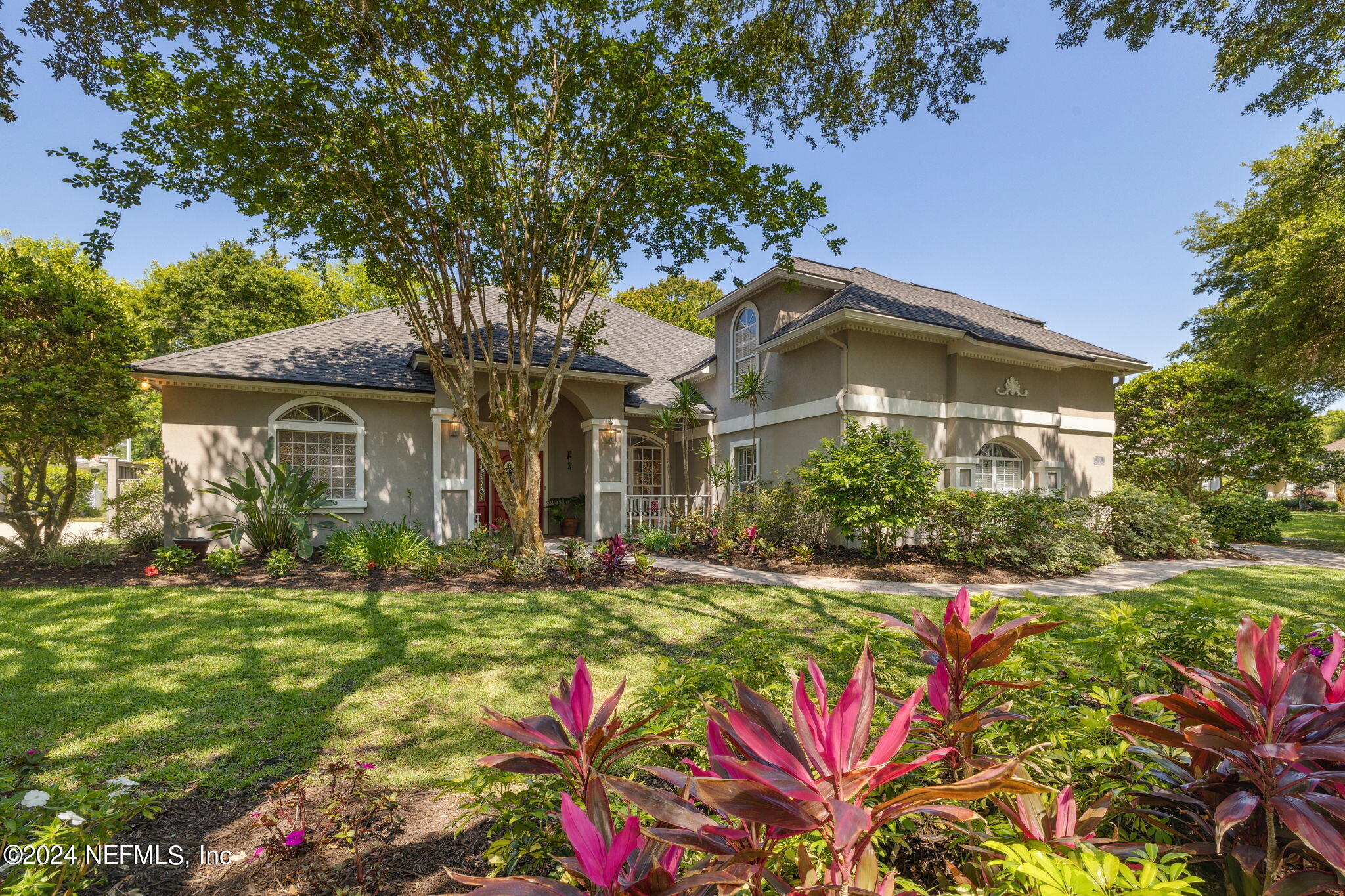 144 Bear Pen Road Ponte Vedra Beach, FL 32082 - Photo 3 of 74 a front view of a house with a yard