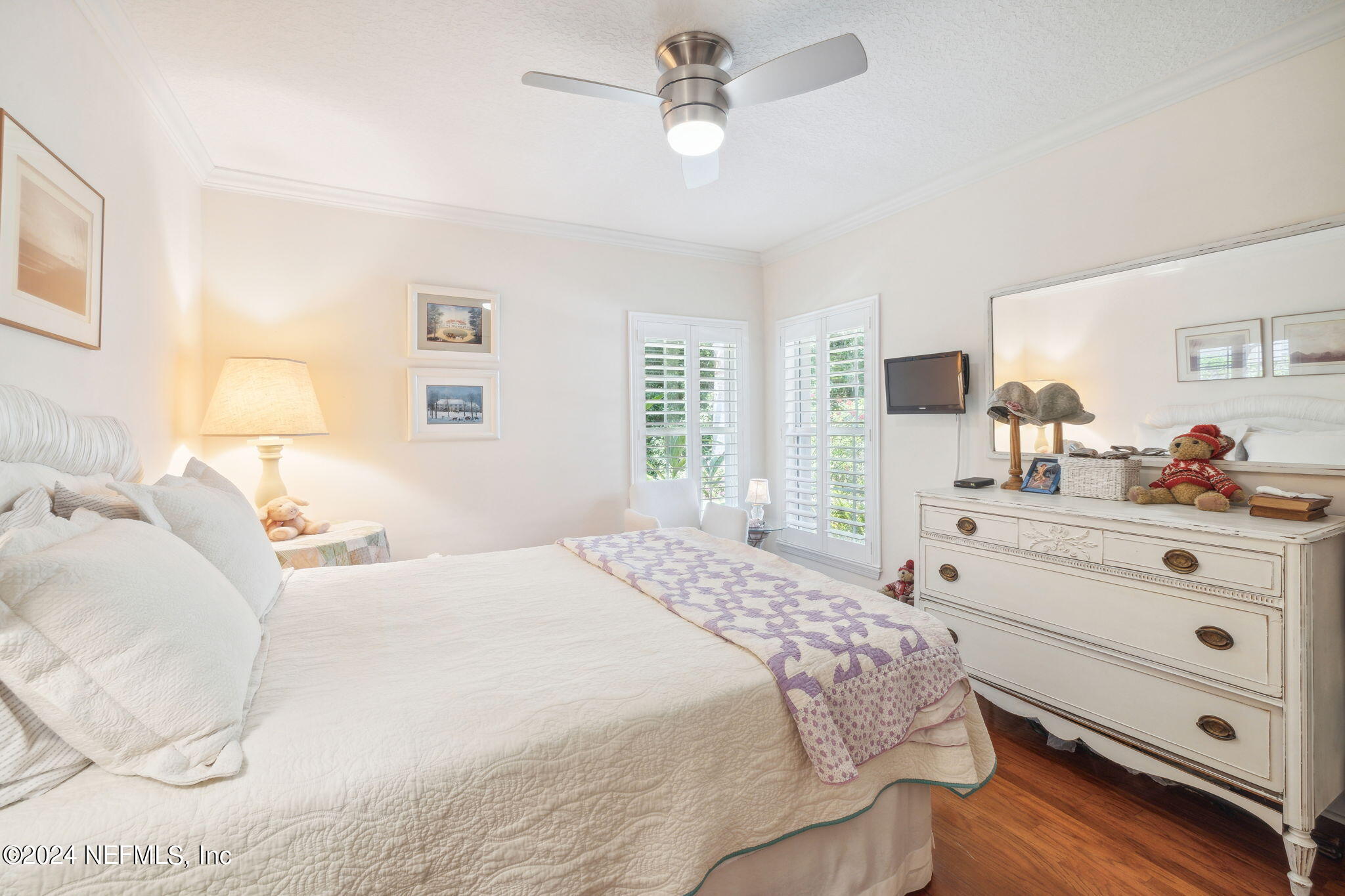 144 Bear Pen Road Ponte Vedra Beach, FL 32082 - Photo 36 of 74 a bedroom with a bed and a dresser