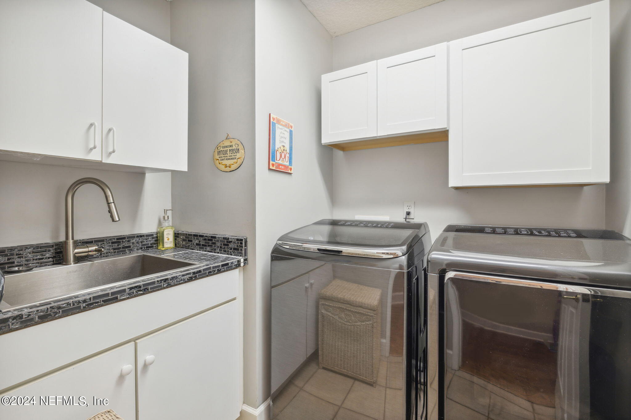 144 Bear Pen Road Ponte Vedra Beach, FL 32082 - Photo 44 of 74 a utility room with sink dryer and washer