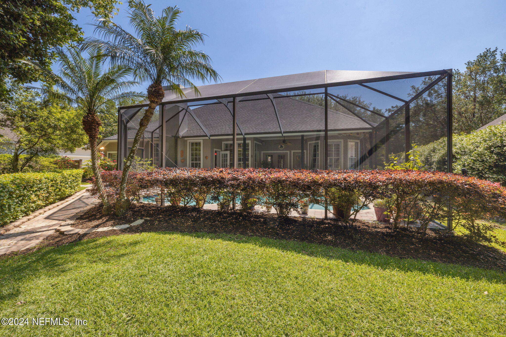144 Bear Pen Road Ponte Vedra Beach, FL 32082 - Photo 48 of 74 front view of a house with a yard