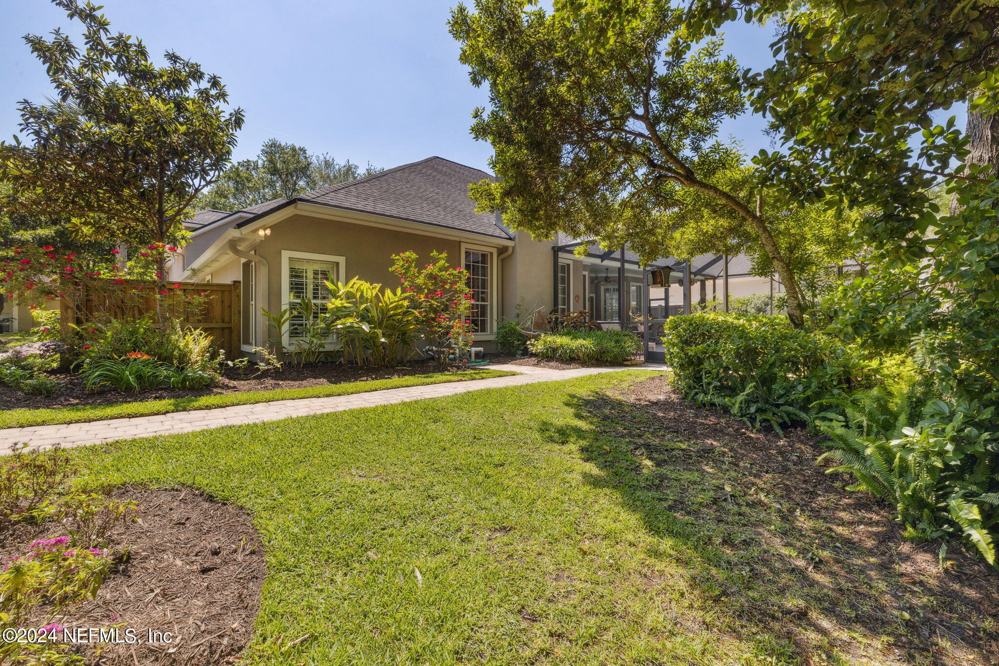 144 Bear Pen Road Ponte Vedra Beach, FL 32082 - Photo 50 of 74 a front view of a house with a yard