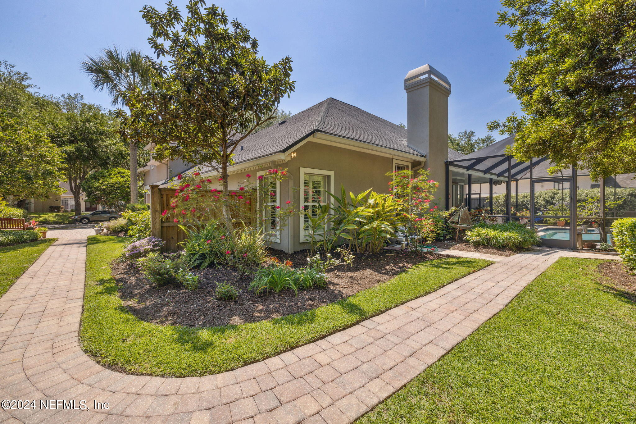 144 Bear Pen Road Ponte Vedra Beach, FL 32082 - Photo 51 of 74 a front view of a house with garden