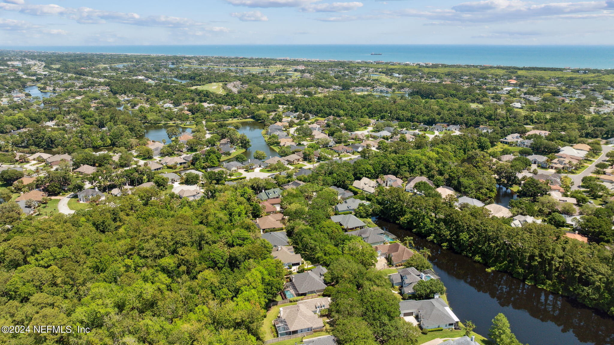 144 Bear Pen Road Ponte Vedra Beach, FL 32082 - Photo 60 of 74 an aerial view of residential houses with outdoor space and trees