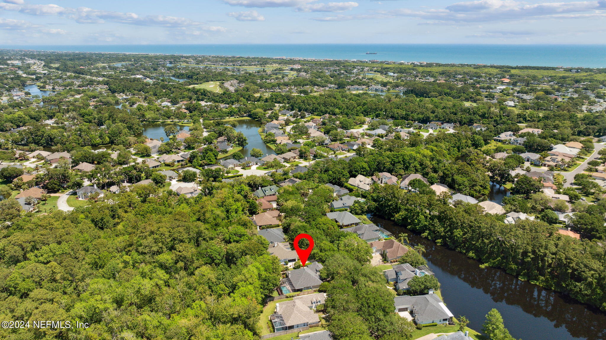 144 Bear Pen Road Ponte Vedra Beach, FL 32082 - Photo 61 of 74 an aerial view of residential houses with outdoor space and trees