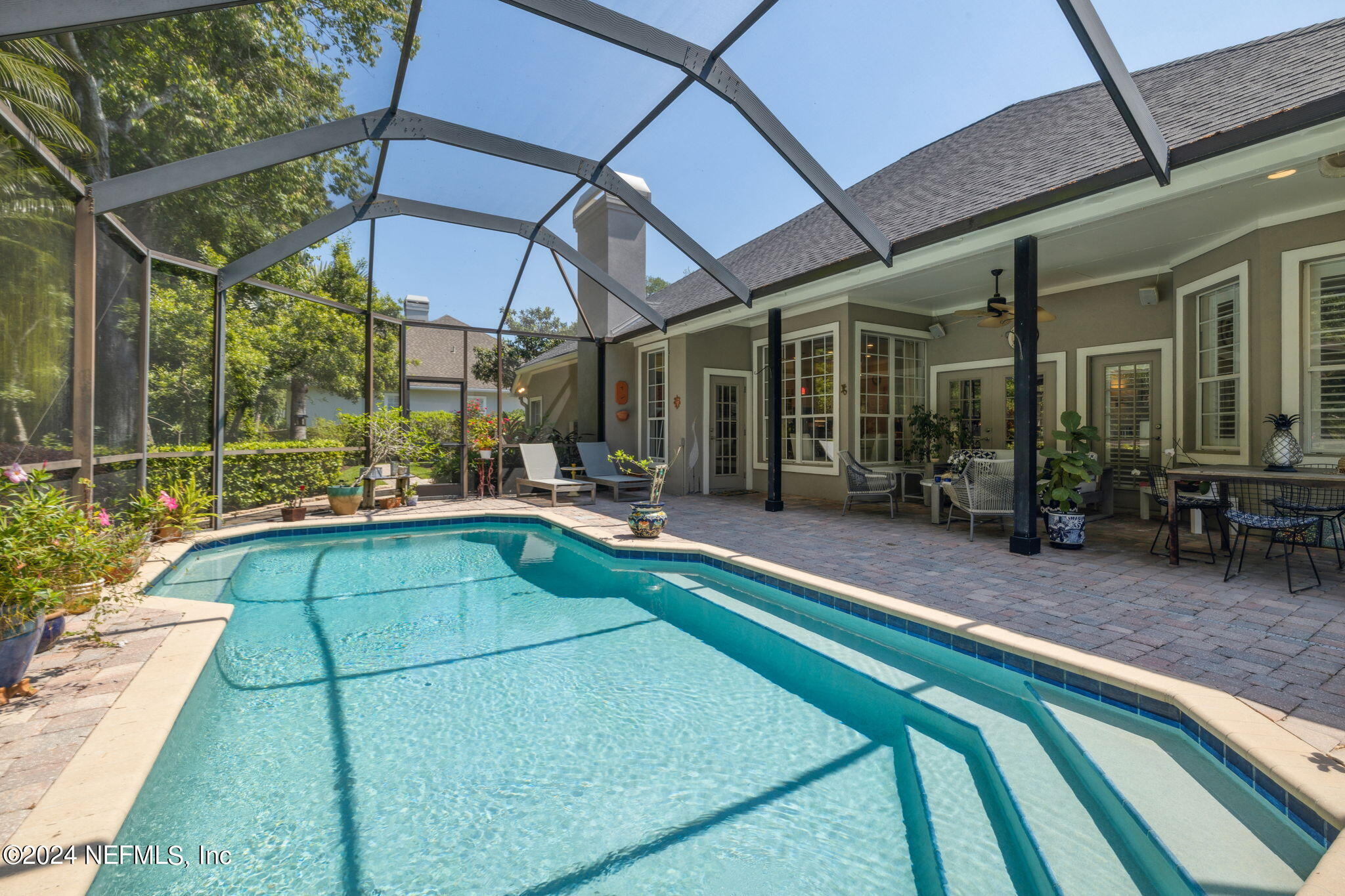 144 Bear Pen Road Ponte Vedra Beach, FL 32082 - Photo 7 of 74 a swimming pool with patio outdoor seating and yard