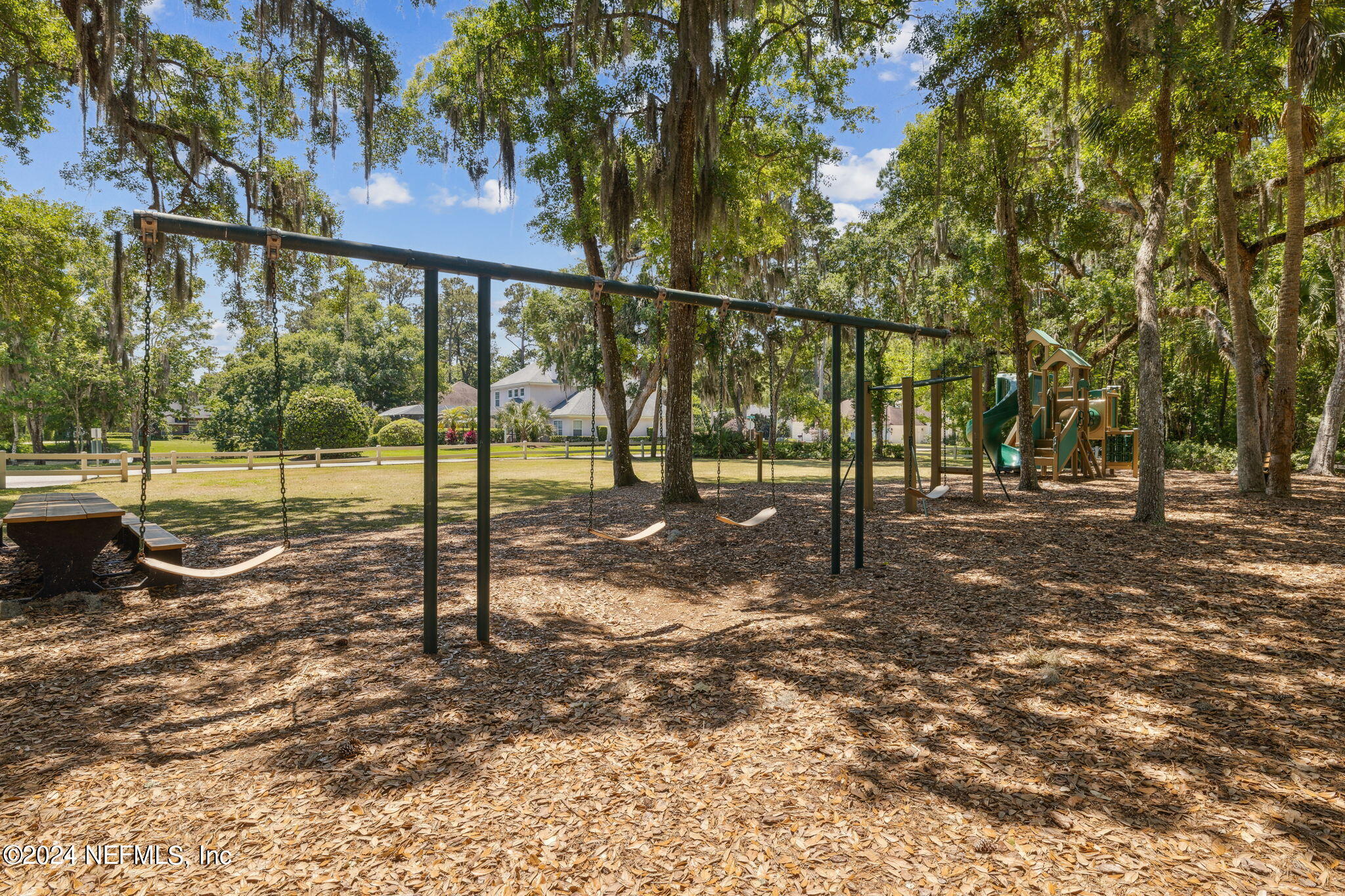 144 Bear Pen Road Ponte Vedra Beach, FL 32082 - Photo 71 of 74 a view of a park with swings
