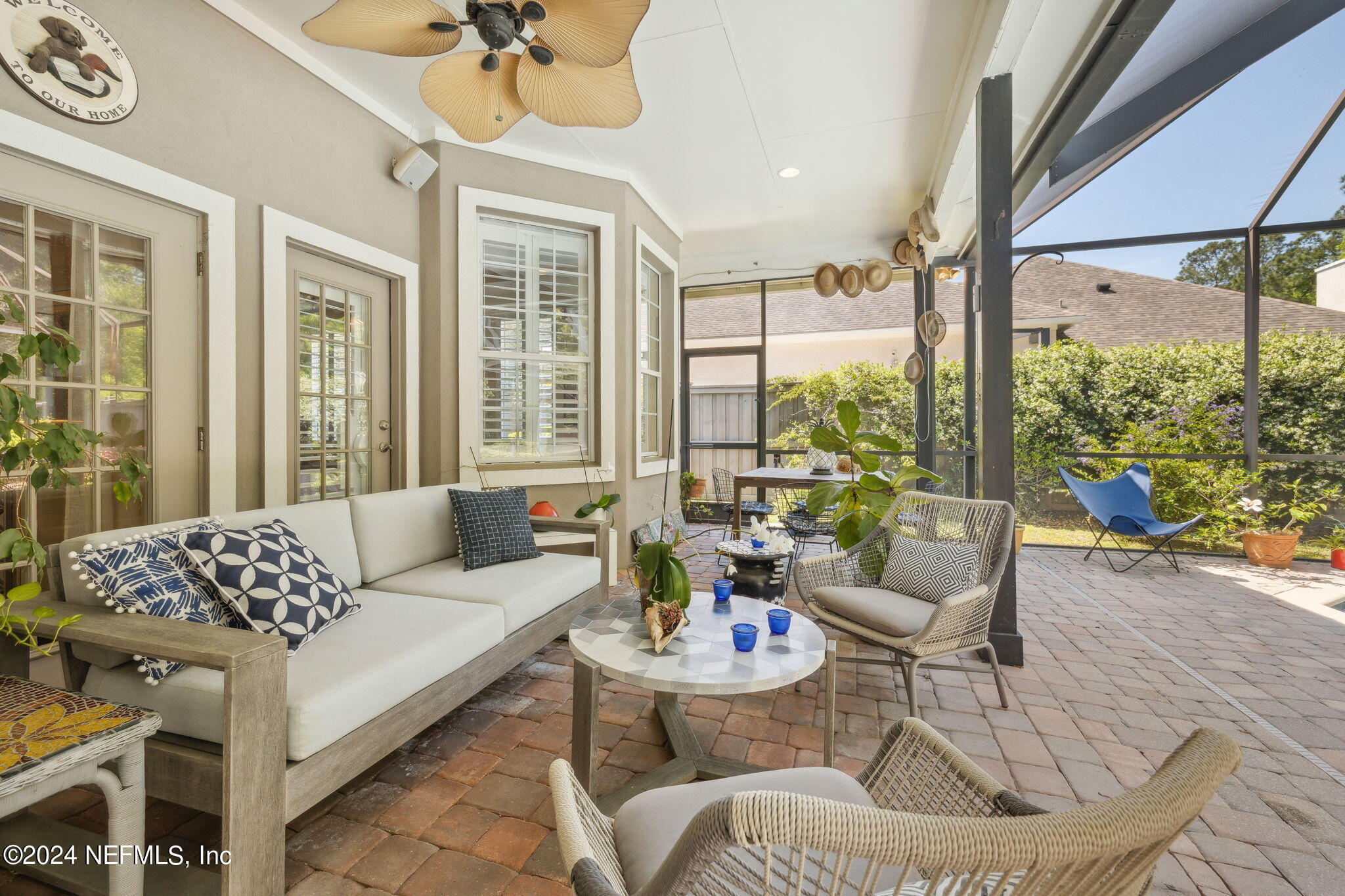 144 Bear Pen Road Ponte Vedra Beach, FL 32082 - Photo 8 of 74 a living room with furniture and a large window