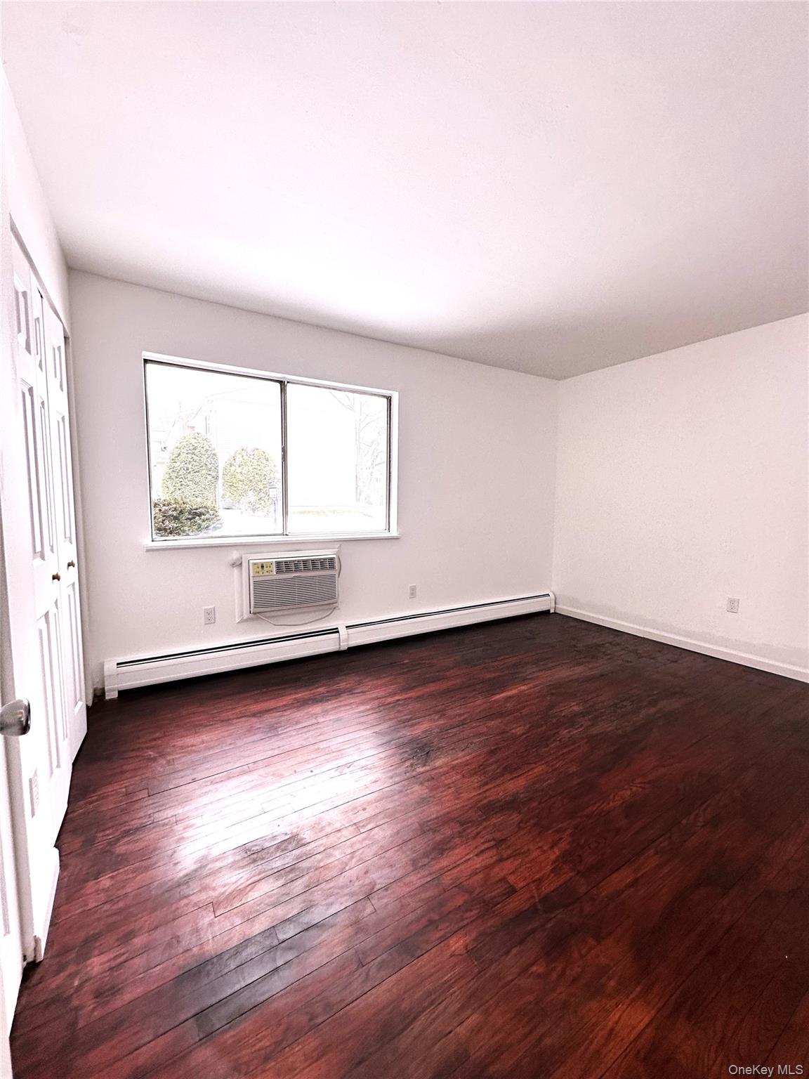2740 South Road, Unit B7 Poughkeepsie, NY 12601 - Photo 12 of 16 Freshly Painted, newly sanded floor, new built in ac unit, ne 6 panel door.