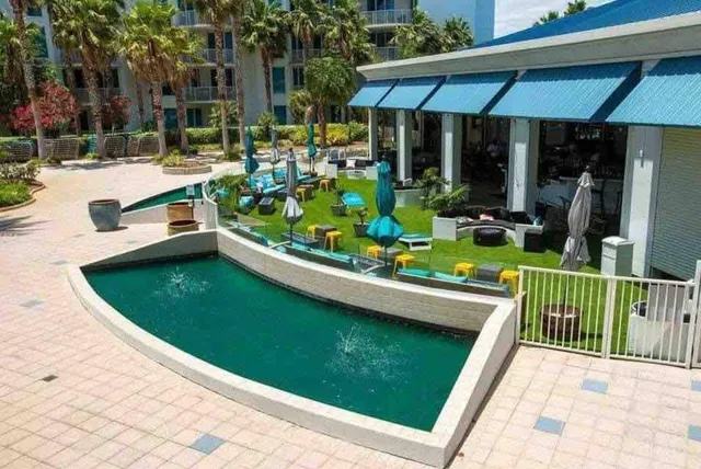 a view of a chairs and tables in the patio