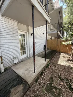 a view of a backyard with a chair