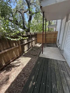a view of backyard with wooden floor