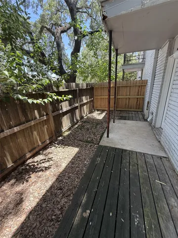 a view of backyard with wooden floor