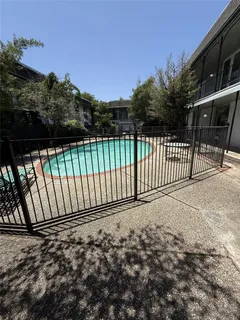a view of a yard with a street