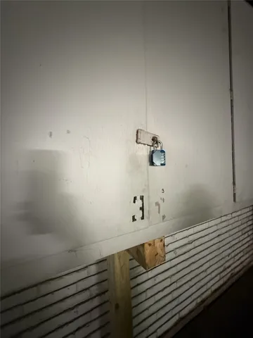 a view of parking garage with cars