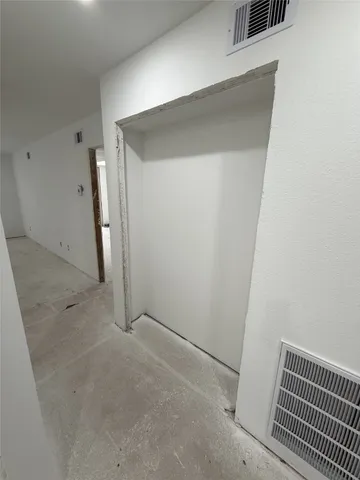 an empty room with a door
