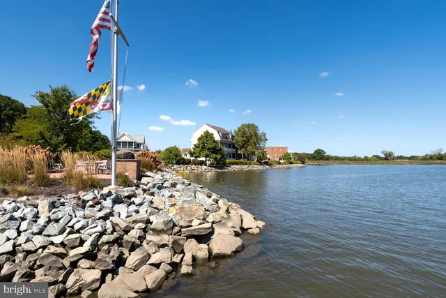 a roof deck with lake view