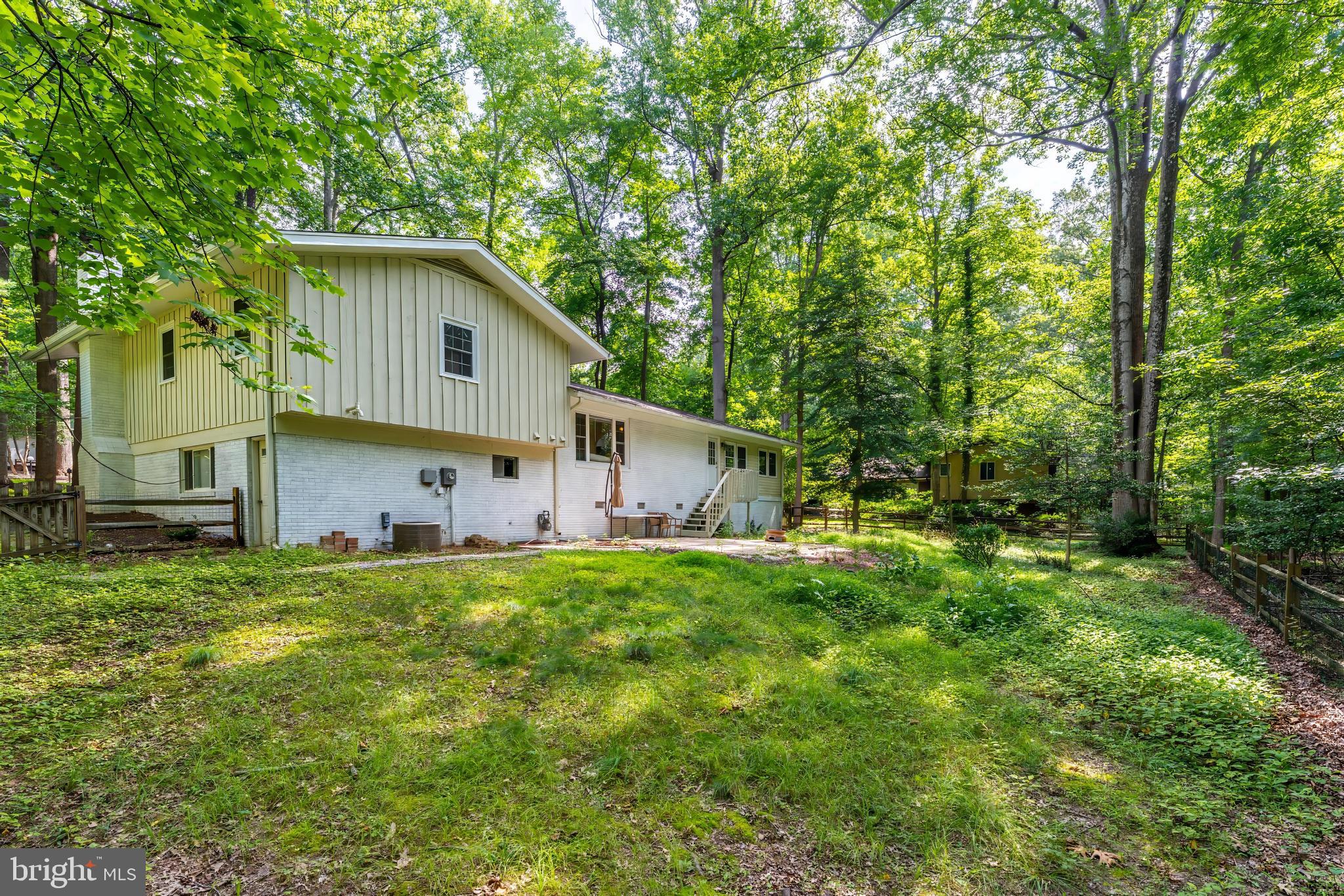 11621 Sourwood Lane Reston, VA 20191 - Photo 8 of 26 a house view with a outdoor space