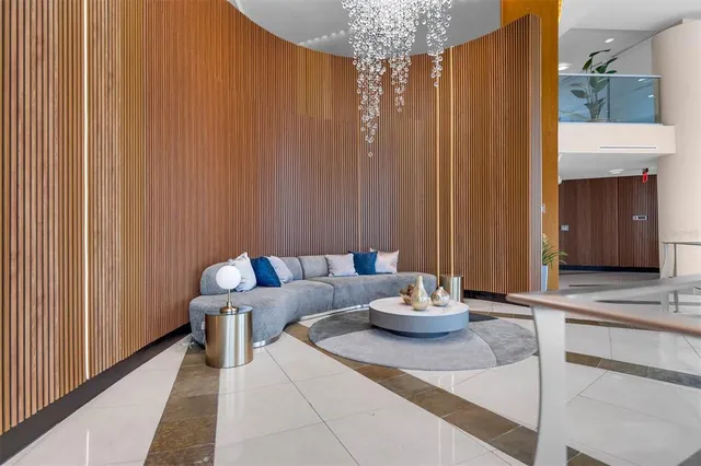 a balcony with furniture and a window