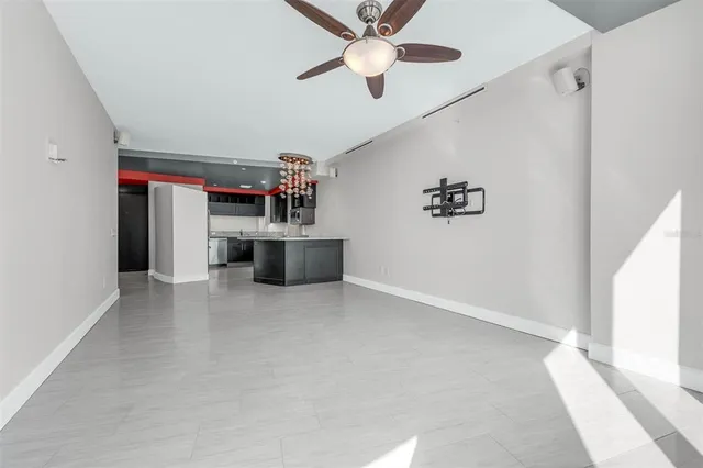 a view of a kitchen with a sink and cabinet
