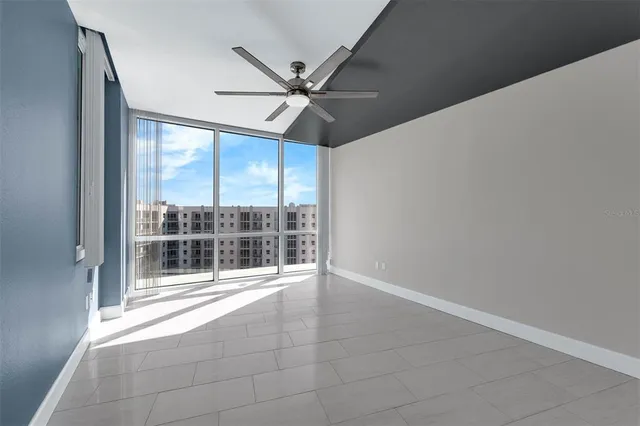 a view of an empty room with a window